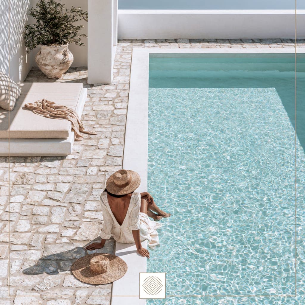 An owner relaxing by their own pool
